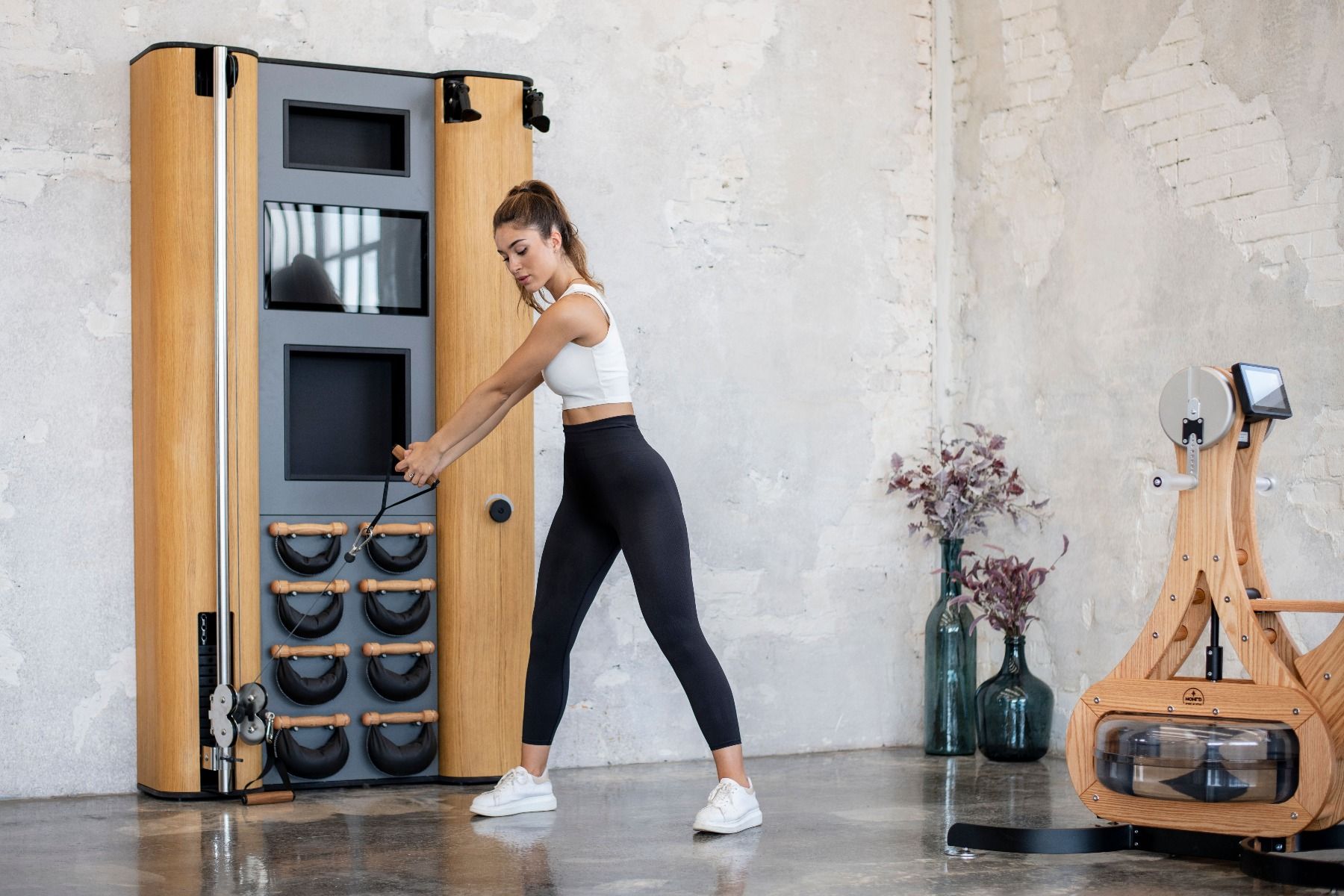 woman using a cable machine