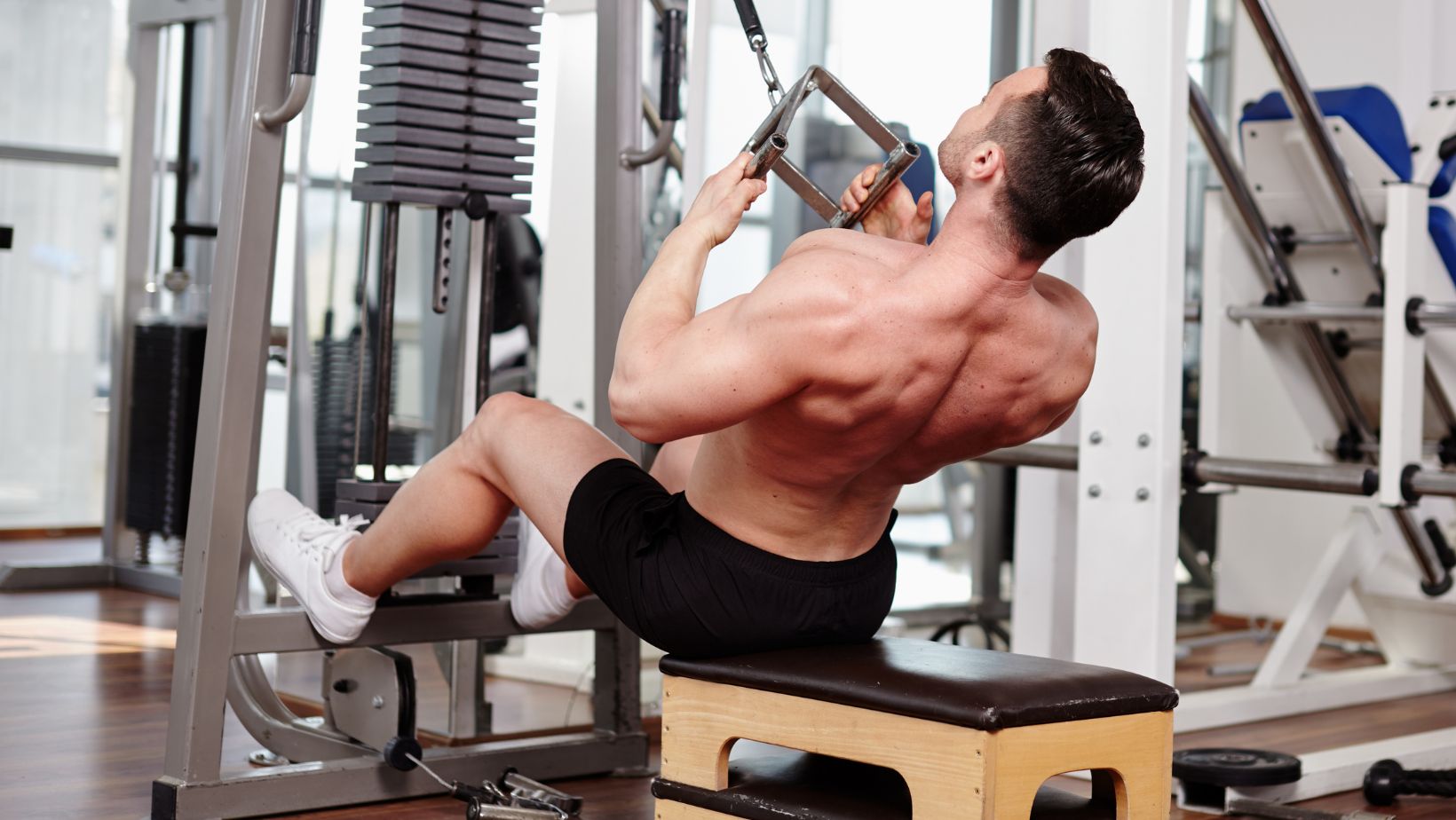 Man using cable machine