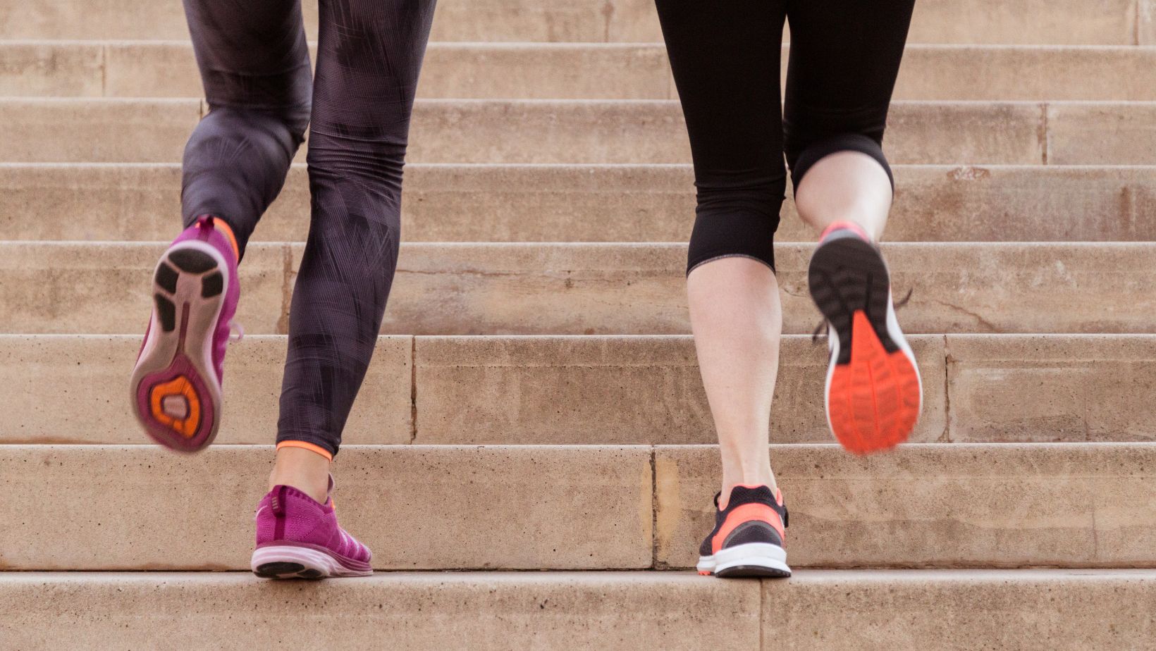 People exercising on a staircase